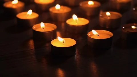 Lots of candles burning - slide over Video stock 122821797