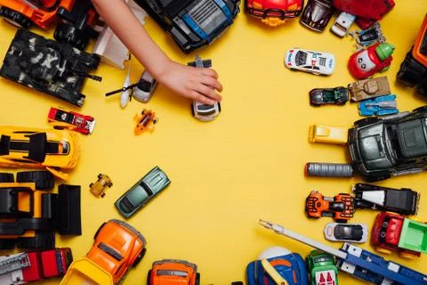 Lots of children's toy-developing machines for games as a background Stock Photos
