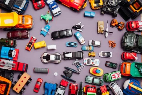 Lots of children's toy-developing machines for games as a background Stock Photos