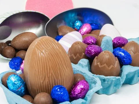 Lots of chocolate Easter eggs in an egg carton Stock Photos