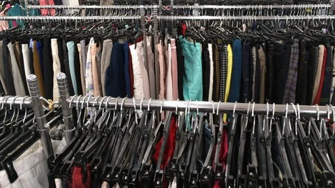 Lots of clothes at a second hand shop 스톡 동영상 116105456