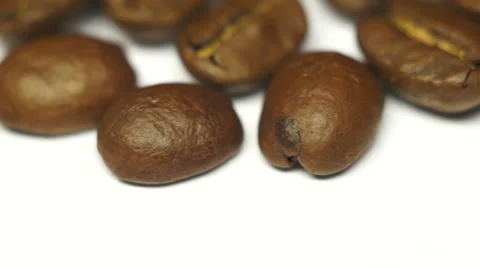 Lots of coffee beans on a white background. Rotation view Stock Footage 45159673