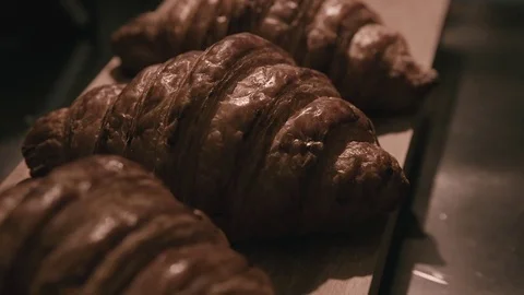 Lots of croissants in the cafe Stock Footage 78032428