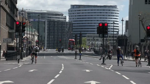 Lots of cyclists daily exercise during Lockdown London Stock Footage 129695574