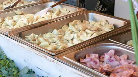 Lots of different flavored traditional classic Polish pierogi with differen.. Stock Footage 256681646