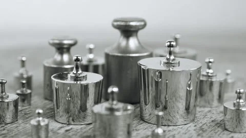 Lots of different metal weights to weigh  zoom out Stock Footage 307508668