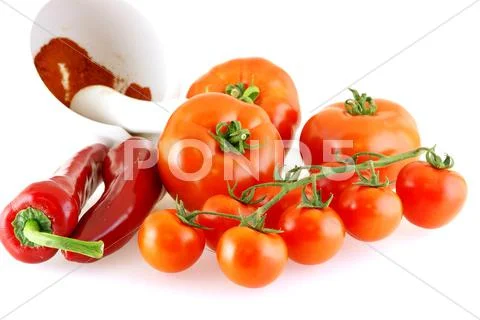 Lots of different tomatoes and red paprika Stock Photos