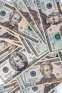 Lots of dollar notes arranged in chaotic manner, background Stock Photos