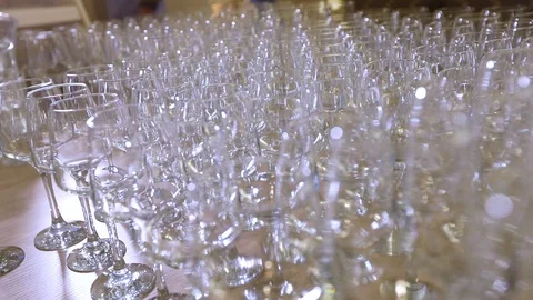 Lots of empty champagne glasses in a row Stock Footage 116973937