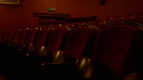 Lots of empty red chairs in the theater. Stock Footage 144329858