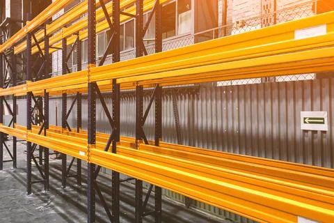 Lots of empty shelves in the warehouse Stock Photos