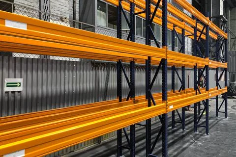 Lots of empty shelves in the warehouse Stock Photos