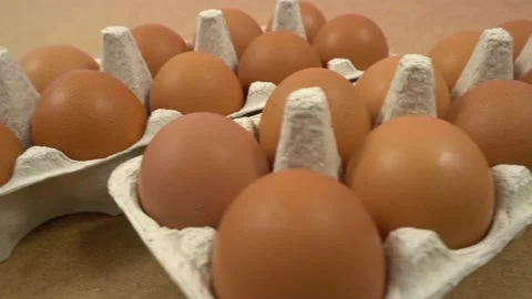 Lots of fresh raw chicken eggs in cardboard boxes, dolly shooting. Chicken br Stock Footage 166488922