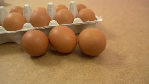 Lots of fresh raw chicken eggs in cardboard boxes, dolly shooting. Chicken br Stock Footage 176887923