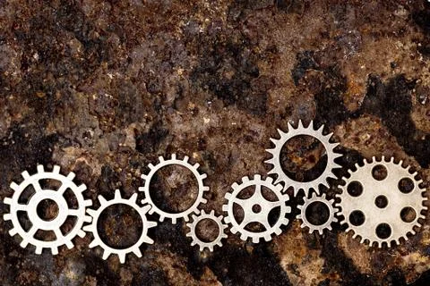 Lots of gears on rusty background, concept gearing 스톡 사진