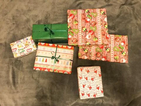 Lots of Gift boxes on white background. Presents in craft and colored paper d 스톡 사진