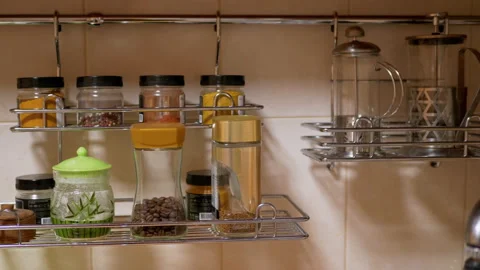 Lots of Glass Spice Jars, Kitchen Utensils, Located in Kitchen Railing System Stock Footage 149901736