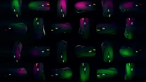 Lots of glowing computer mice are slowly rotating in the digital background Stock Footage 197351633