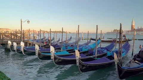 Lots of gondolas docking on the Venice canal in Venice Italy Stock Footage 83593164