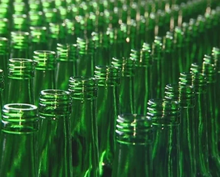 Lots of green bottle being prepared for packaging in factory. Stock Footage 8523746