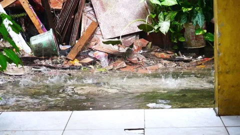 Lots of heavy rain on the ground in front of the house. Stock Footage 218431425