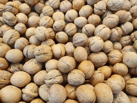 Lots of inshell walnuts Foto stock