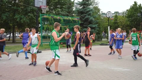 Lots of kids playing basketball on the court Russia Stary Oskol 5 2020 2020 Stock Footage