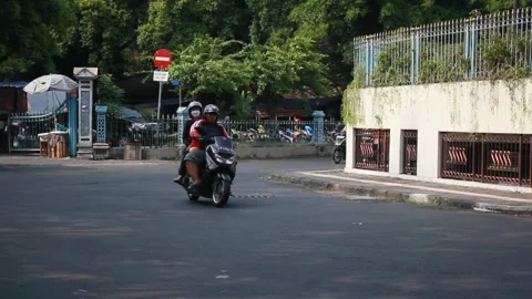 Lots of motorbikes passing by on the hemp highway Stock Footage 280444259