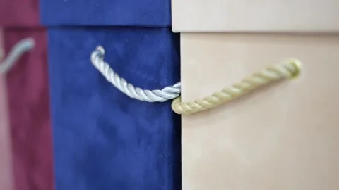 Lots of multi-colored gift boxes with handles. Stock Footage 143854360