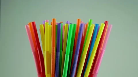 Lots of multicolored plastic disposable cocktail straws. Stock Footage 201145266
