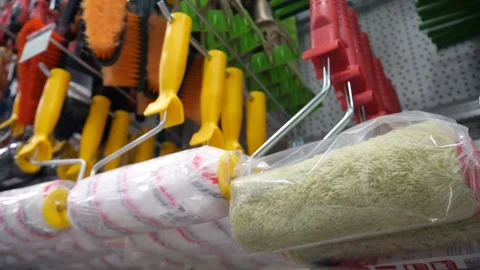 Lots of new construction rollers for painting. New construction equipment. Video stock 312797031