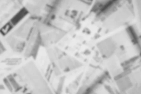 Lots of old newspapers on horizontal surface. Background texture, top view,.. Stock Photos