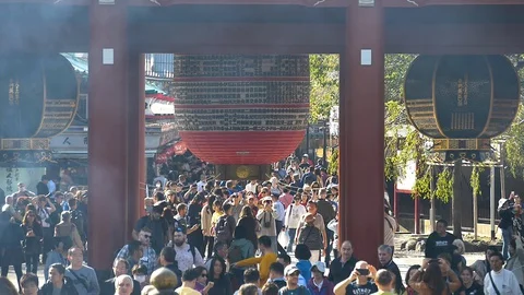 Lots of people in the crowd inside Senso-ji in Tokyo Japan Stock Footage 129280742