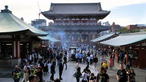 Lots of people going around the Senso-ji Temple in Tokyo Japan Stock Footage 121433933