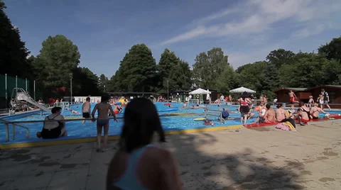 Lots of people at the swimming pool Stock Footage 36760959