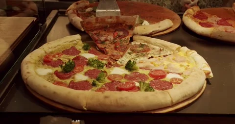 Lots of Pizza slice on the Table in a Pizzeria. Delicious Pizza. Stock Footage 246729958