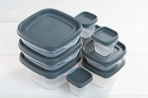 Lots of plastic containers with lids Stock Photos