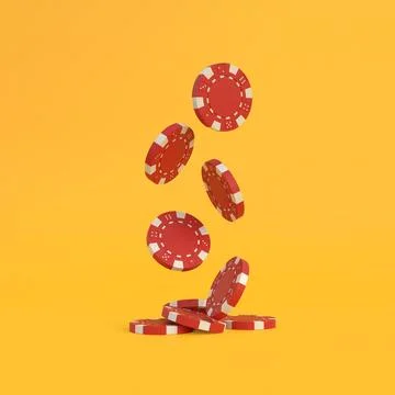 Lots of red poker chips falling down on a yellow background with copy space Stockillustratie