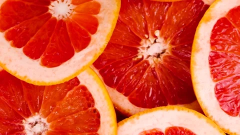 Lots of round grapefruits on the table Stock Footage 235054320