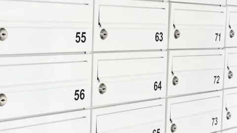 Lots of simple white mailboxes, many numbered letterboxes detail, closeup Stock Footage 152989018