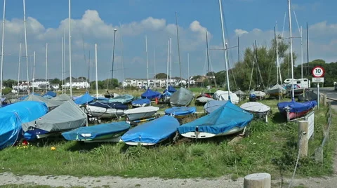 Lots of small sailing boats covered up for winter Stock Footage 48404030