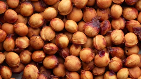 Lots of sour cherry pits as a background closeup. Texture dried cherry kernels Stock Footage 252527379