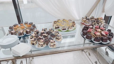 Lots of sweet cakes on the buffet table Stock Footage 148157909