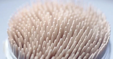 Lots of toothpicks in a jar Stock Footage 166650774