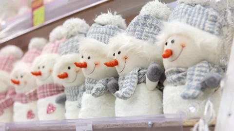 Lots of toy plus snowman on the store shelf. Christmas shopping. Stock Footage 321310970