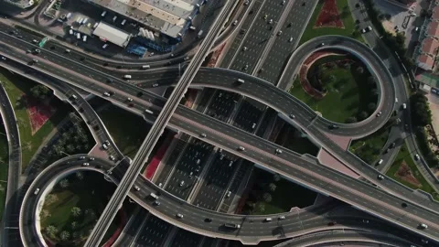 Lots of traffic on a huge intersection on a highway in Dubai, UAE, top view, 4k 스톡 동영상 151931558
