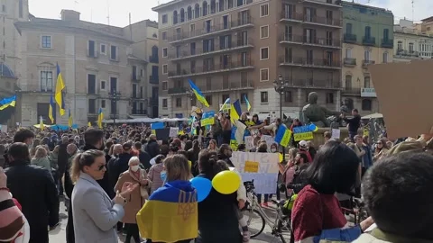 Lots of Ukraine flags during protest against war and invasion of Ukraine Stock Footage 171080081