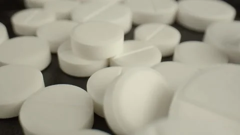 Lots of vitamins in the form of hard tablets on the black background. Care for Stock Footage 164382721