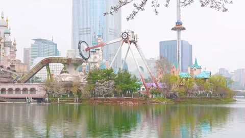 Lotte World Adventure Theme Park and Seokchon Lake in Seoul South Korea on .. Stock Footage 336838867