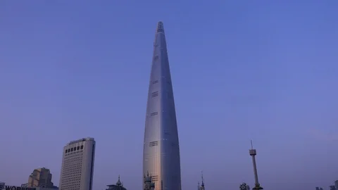 Lotte World Tower against bright evening sky, Seoul, South Korea Stock Footage 94366104